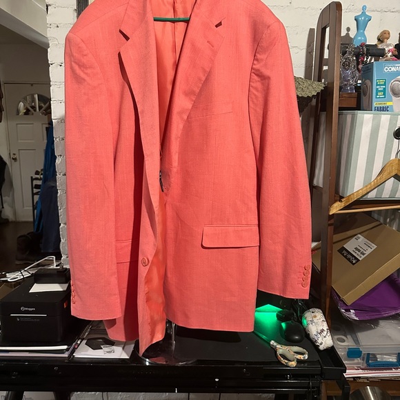 Vibrant Pink Blazer with Notched Lapel and Textured Fabric